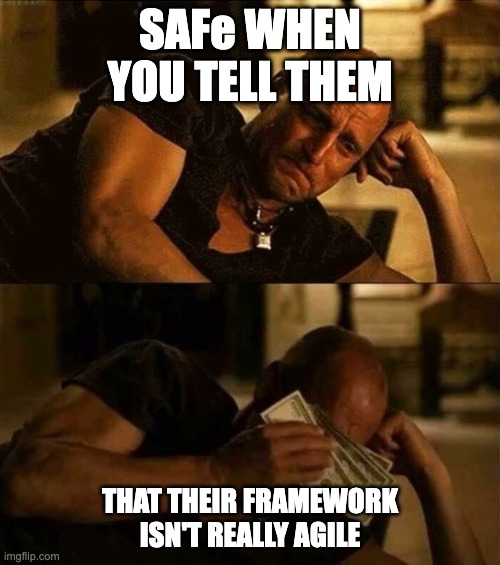 Meme featuring a man resting his head on his hand looking frustrated in the top panel, and drying his tears with money in the bottom panel, with caption: SAFe when I tell them, that their framework isn't really agile.